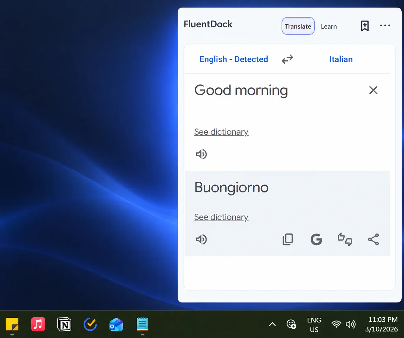 FluentDock translation window beside the Windows 11 taskbar